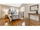 This bedroom features a metal bed frame, hardwood floors, and plenty of natural light at 5805 Forest Ln, Indianapolis, IN 46220