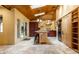 Spacious kitchen with skylights, an island with seating, and stainless steel appliances at 5805 Forest Ln, Indianapolis, IN 46220