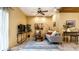 Comfortable living room with a neutral couch, decorative rug, and a floor lamp at 5805 Forest Ln, Indianapolis, IN 46220