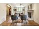 Inviting living room with fireplace, couch, two chairs and an arched doorway to the rest of the house at 5805 Forest Ln, Indianapolis, IN 46220