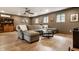 Relaxing living room with plush sofa, hardwood floors, and comfortable seating at 5805 Forest Ln, Indianapolis, IN 46220