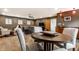 Entertainment space featuring a game table, bar area, and plush seating at 5805 Forest Ln, Indianapolis, IN 46220