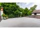 Expansive roof deck surrounded by lush trees, offering a tranquil outdoor space at 5805 Forest Ln, Indianapolis, IN 46220