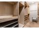 Bright and spacious walk-in closet featuring custom shelving and storage solutions, perfect for organization at 5805 Forest Ln, Indianapolis, IN 46220