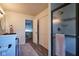 Bathroom with shower and glass door, double closet and view to living room at 6483 Royal Oakland Dr, Indianapolis, IN 46236