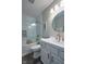 Bright bathroom with white cabinets, granite counter and walk-in shower at 6483 Royal Oakland Dr, Indianapolis, IN 46236