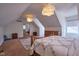 Comfortable bedroom featuring a large bed and lots of floor space at 6483 Royal Oakland Dr, Indianapolis, IN 46236
