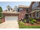 Lovely two-story brick home with a two car garage and well manicured landscaping at 6483 Royal Oakland Dr, Indianapolis, IN 46236