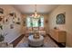 Charming living room with a chandelier, bay window, and stylish decor, creating an inviting atmosphere at 6483 Royal Oakland Dr, Indianapolis, IN 46236