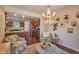 Sitting area has chairs, light, and is right off of the kitchen at 6483 Royal Oakland Dr, Indianapolis, IN 46236