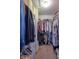 Spacious walk-in closet with plenty of hanging storage and shelving for organization at 6483 Royal Oakland Dr, Indianapolis, IN 46236
