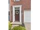 Close-up of the front door, showcasing a wreath and well-manicured entrance at 6927 Havenmoor Pl, Indianapolis, IN 46250