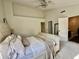 Bright main bedroom featuring neutral decor, vaulted ceiling, and ensuite bathroom access at 6927 Havenmoor Pl, Indianapolis, IN 46250