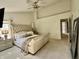 Spacious main bedroom featuring neutral tones, vaulted ceiling, and plush carpeting at 6927 Havenmoor Pl, Indianapolis, IN 46250