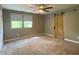 The spacious bedroom is enhanced by a modern barn door feature at 706 N Euclid Ave, Indianapolis, IN 46201