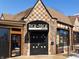 Charming brick exterior with a unique roof design and inviting entrance to the Tick-Tock Lounge at 706 N Euclid Ave, Indianapolis, IN 46201
