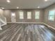 Spacious living room with new floors and natural light at 706 N Euclid Ave, Indianapolis, IN 46201