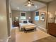 A beautifully staged bedroom is showcased with neutral colors and a ceiling fan at 706 N Euclid Ave, Indianapolis, IN 46201