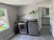 Bright laundry room with modern washer, dryer, and natural light at 707 S Harrison St, Alexandria, IN 46001