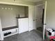 Well-organized mudroom with built-in bench, storage, and convenient access at 707 S Harrison St, Alexandria, IN 46001