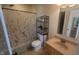 Bathroom featuring a shower with a decorative shower curtain, toilet, and vanity at 713 Driftwood Cir, Danville, IN 46122