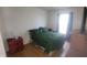 Bedroom with a bed, wood-look flooring, and neutral colored walls at 713 Driftwood Cir, Danville, IN 46122