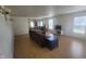 Inviting living room with wood-look flooring and ample space for entertaining at 713 Driftwood Cir, Danville, IN 46122