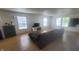 Comfortable living area featuring wood-look floors, neutral paint and natural light at 713 Driftwood Cir, Danville, IN 46122