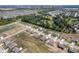 Aerial view of a neighborhood with well-maintained lawns and tree-lined streets at 7834 Fairwood Blvd, Plainfield, IN 46168