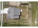 Aerial view of a home with a spacious backyard and well-maintained landscaping at 7834 Fairwood Blvd, Plainfield, IN 46168