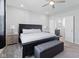 Spacious main bedroom with ensuite bathroom access, a ceiling fan, and neutral décor for a serene atmosphere at 7834 Fairwood Blvd, Plainfield, IN 46168