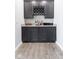 Wet bar area with wine rack and ample storage at 7834 Fairwood Blvd, Plainfield, IN 46168