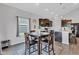 The dining area features a table with chairs, a window, and connects to the kitchen area at 8044 Yarmouth Way, Indianapolis, IN 46239