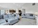 Inviting living room featuring neutral decor, comfortable seating, and open concept design to kitchen at 8044 Yarmouth Way, Indianapolis, IN 46239