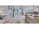 Cozy living room featuring plush gray couches and lots of natural light at 8044 Yarmouth Way, Indianapolis, IN 46239