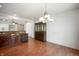 Cozy dining area with elegant chandelier and views of the backyard at 8199 Sydney Ln, Avon, IN 46123