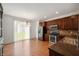 Modern kitchen with stainless steel appliances and dark wood cabinetry at 8199 Sydney Ln, Avon, IN 46123