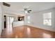 Inviting living room with wood floors, ceiling fan, and abundant natural light at 8199 Sydney Ln, Avon, IN 46123