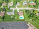 Aerial view of residential neighborhood featuring brick ranch home with in-ground pool at 8209 Burn Ct, Indianapolis, IN 46217