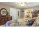 Comfortable bedroom with a ceiling fan, closet, and access to a vanity and full bathroom at 8209 Burn Ct, Indianapolis, IN 46217