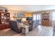 Cozy living room with brick fireplace, wood built-ins, and comfortable seating arrangement at 8209 Burn Ct, Indianapolis, IN 46217