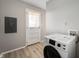 Laundry room with washer and access to the exterior at 829 Meadow Ln, Greenfield, IN 46140