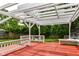 Beautiful backyard with a large deck and mature trees for shade and privacy at 8445 Montery Rd, Indianapolis, IN 46226