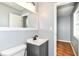 Bathroom with tile floor, modern vanity, and a grey paint at 8445 Montery Rd, Indianapolis, IN 46226