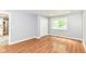 Bedroom boasts hardwood floors, neutral paint, and a closet at 8445 Montery Rd, Indianapolis, IN 46226
