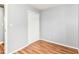 Bedroom featuring hardwood floors, neutral paint, and a closet at 8445 Montery Rd, Indianapolis, IN 46226