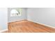 Bedroom featuring hardwood flooring and window at 8445 Montery Rd, Indianapolis, IN 46226