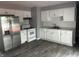 Stylish updated kitchen with white cabinets, stainless steel appliances, and a modern aesthetic at 8445 Montery Rd, Indianapolis, IN 46226