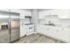Modern kitchen featuring white cabinets, stainless appliances, and updated countertops at 8445 Montery Rd, Indianapolis, IN 46226