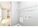 Functional laundry room features convenient storage, washer hookups and dryer hookups at 8445 Montery Rd, Indianapolis, IN 46226